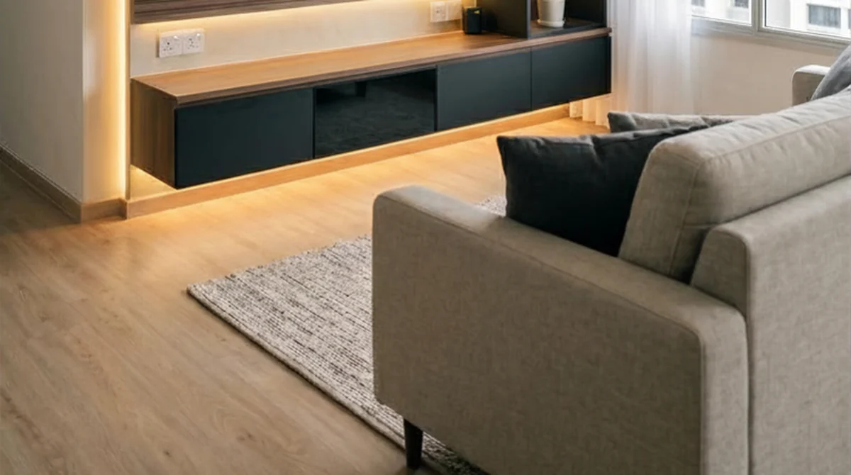 Flooring contractor work in Singapore: wood-look vinyl plank flooring in an HDB living room