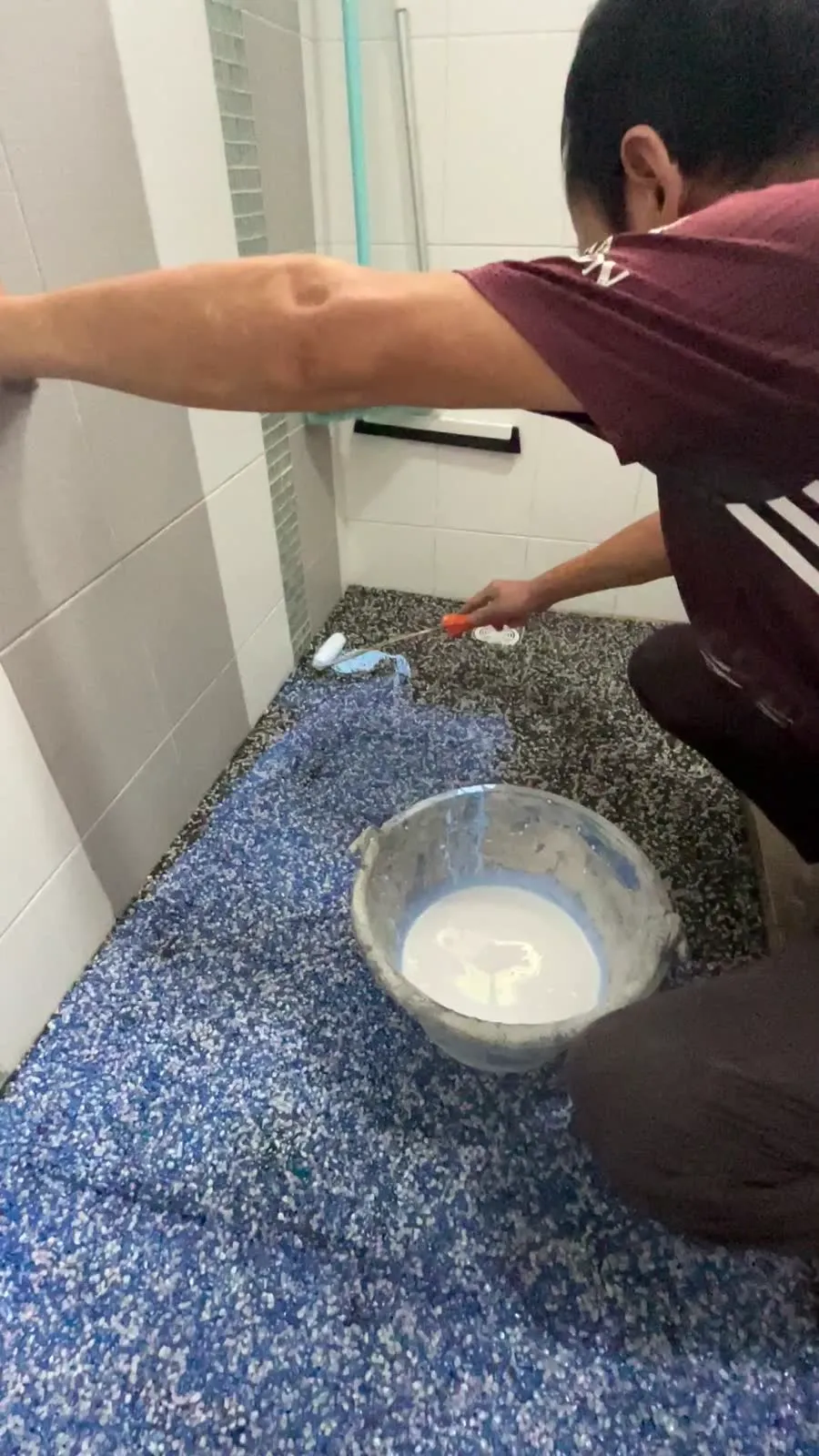 Waterproofing membrane applied before tiling a Singapore bathroom