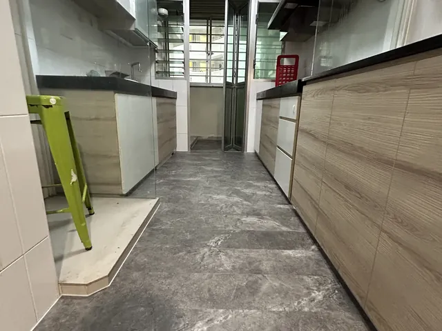 Choa Chu Kang HDB kitchen with marble-look vinyl flooring