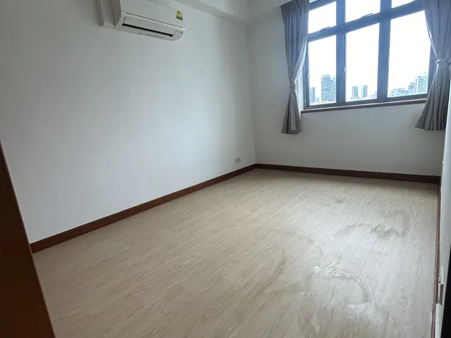 Mirage Tower condo bedroom with light oak vinyl flooring