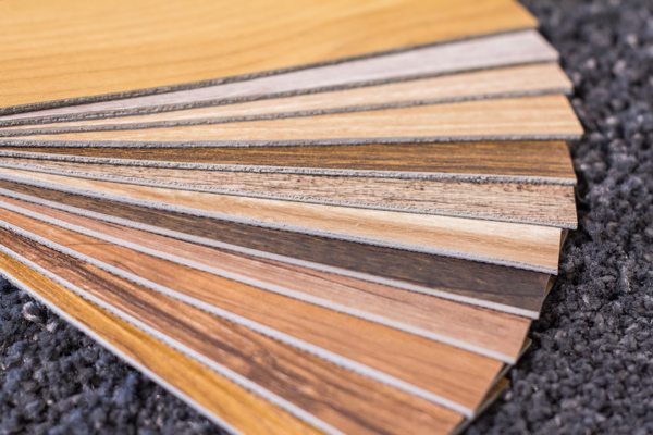 Wood look vinyl plank flooring samples with natural finishes